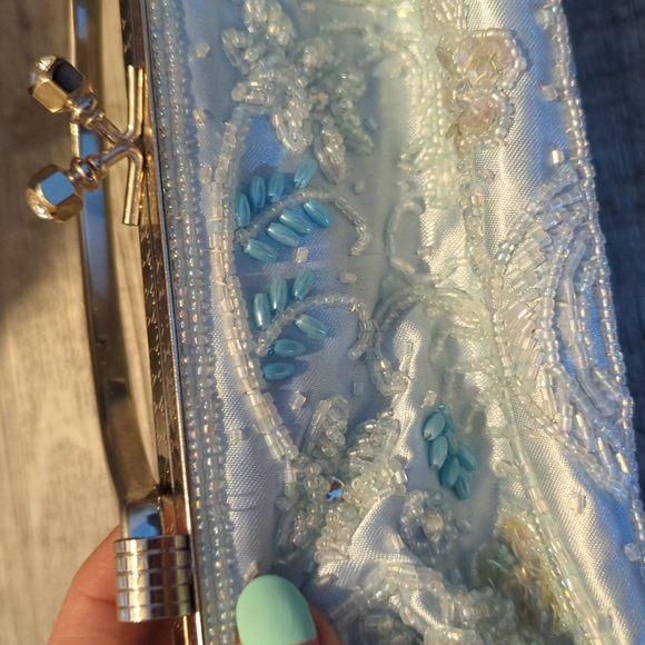 2 for $20 Beautiful beaded clutch. Used once. Light blue with silver accents. - Picture 2 of 3